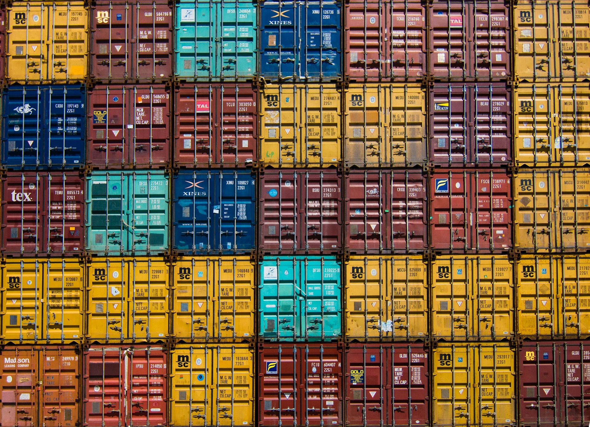 Shipping containers and trailers stacked for freight handling